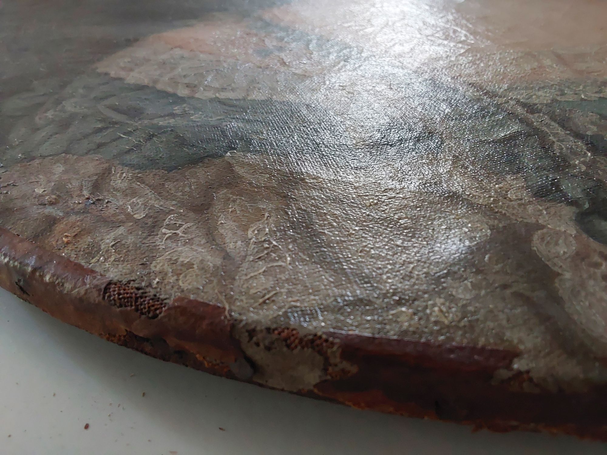 Détail de la toile avant restauration